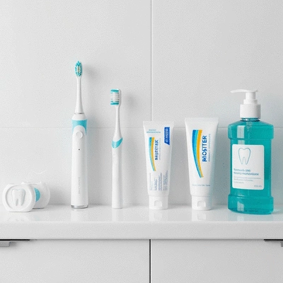 Various dental hygiene products neatly arranged